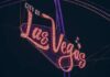 Neon sign reading 'City of Las Vegas' illuminated at night