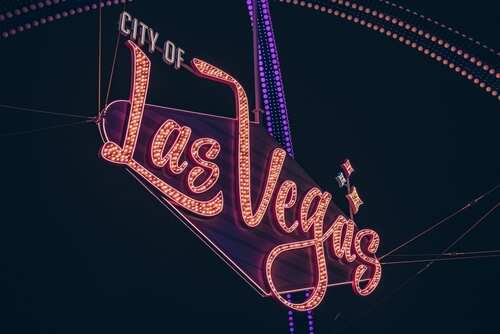 shutterstock_2563578249.jpg Neon sign reading 'City of Las Vegas' illuminated at night
