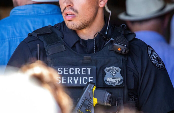 Secret Service agent in uniform with communication gear