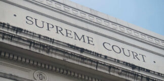 Building facade with Supreme Court signage visible
