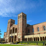 Brick building with arched windows and blue sky