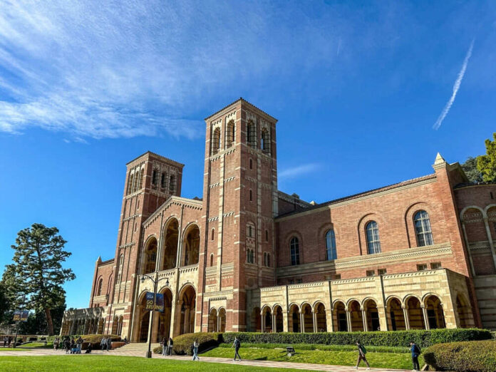 Brick building with arched windows and blue sky