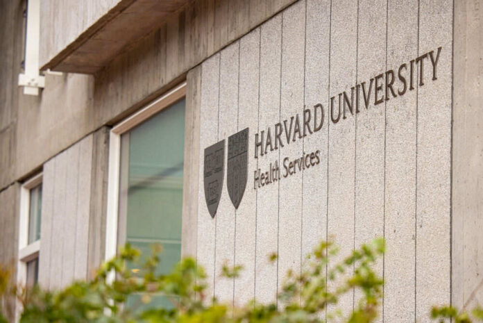 Harvard University Health Services building sign and emblem