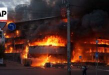 Fires burn in Kyiv after Russia uses hypersonic missile in mass attack on Ukraine