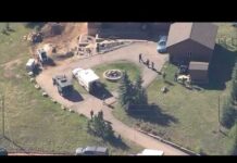 Suspect accused of shooting 2 troopers taken into custody
